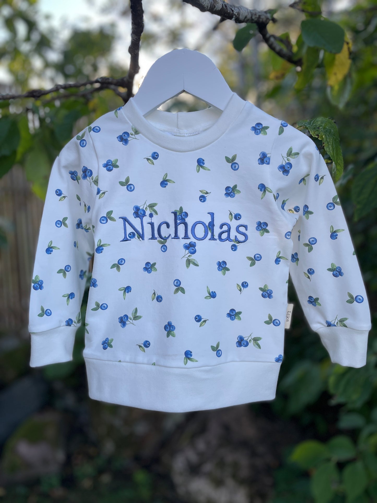Tröja med broderat namn