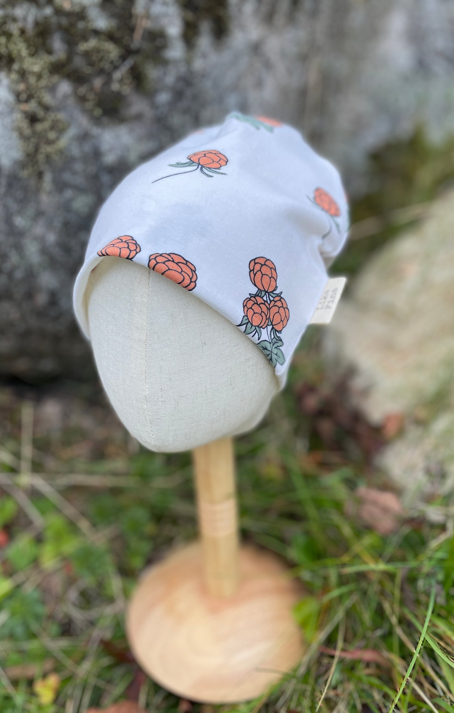 Mössa i trikå med hjortron