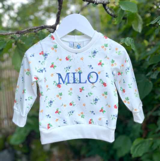 Tröja med broderat namn