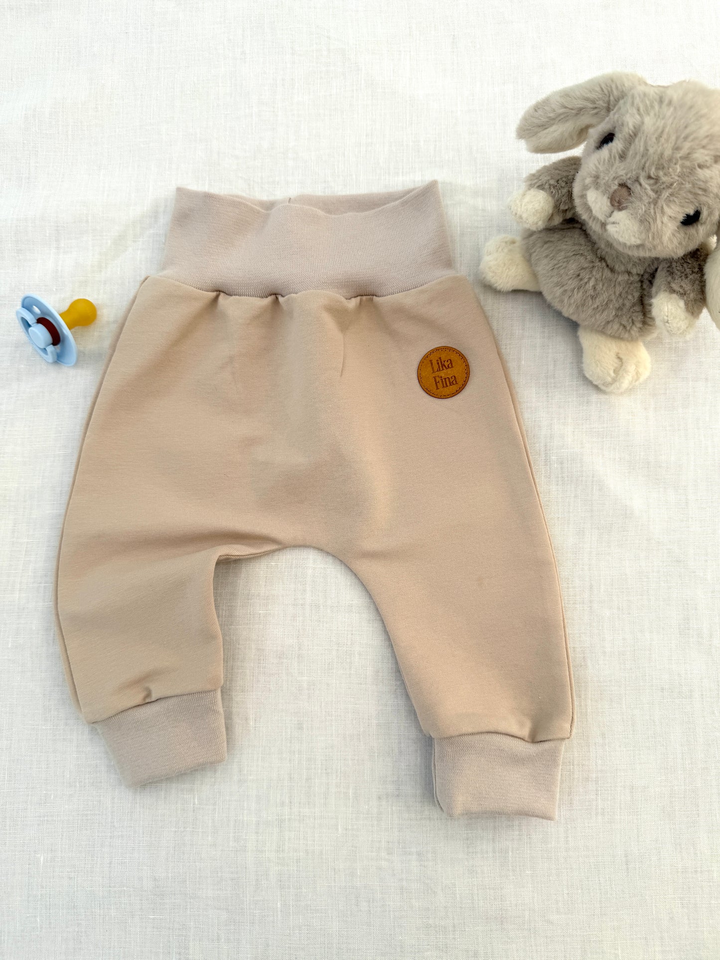 Baggybyxa ljusbeige stl 62