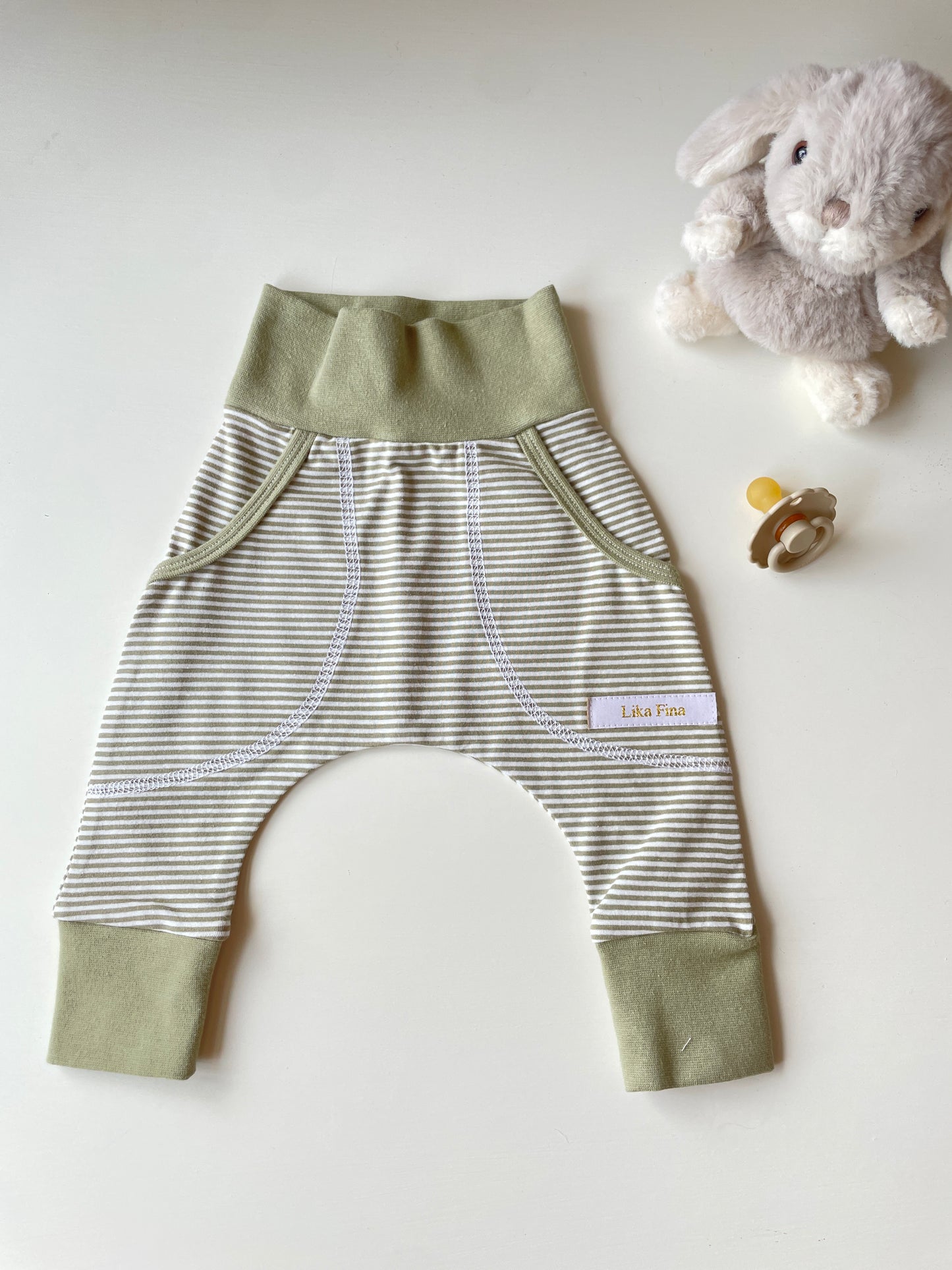 Byxa baggy randig oliv  Nu rea 50/56 62/68